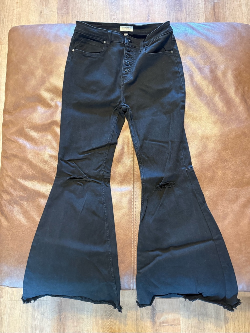 Shyanne Black Flared Button-Fly Jeans with Distressed Knees